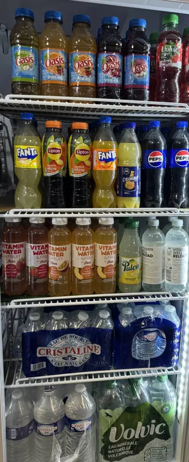 Frigo eaux et sodas de l'épicerie Proxi Dombasle